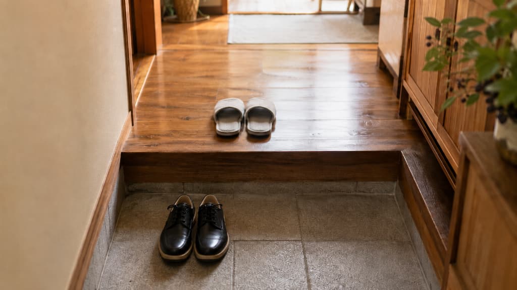 Taking shoes off at the genkan, a key piece of Japanese etiquette for visitors and expats