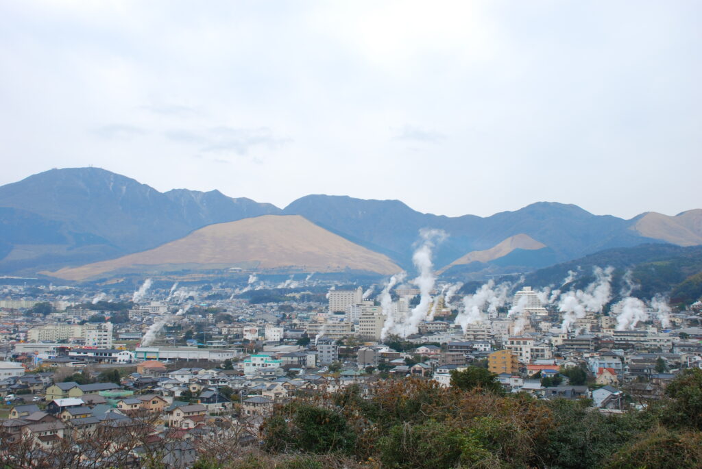 Steam rising from the hot springs of Beppu in Kyushu