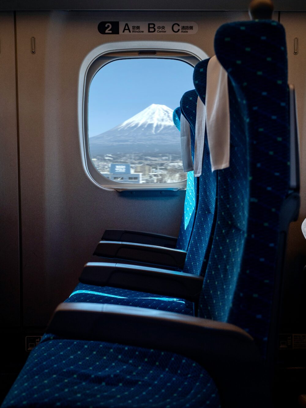View from a shinkansen bullet train at a Japanese station, the backbone of getting around Japan