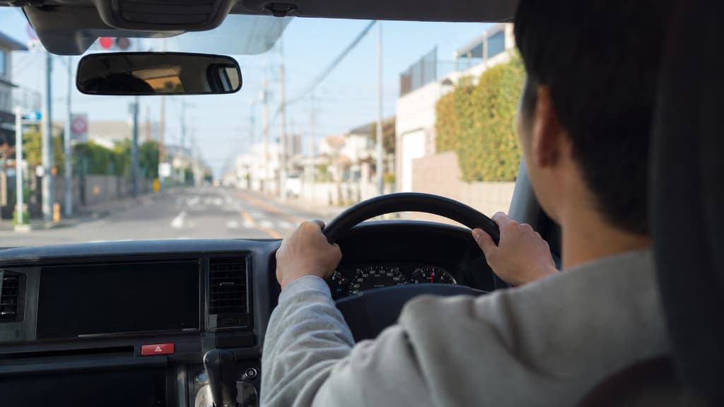 A person driving in Japan after converting a foreign driver's license